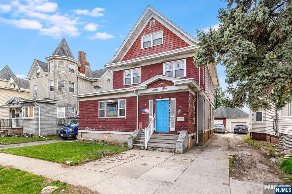 Photo of 65 Marsellus Place, Garfield, NJ 07026 (MLS # 26007174)