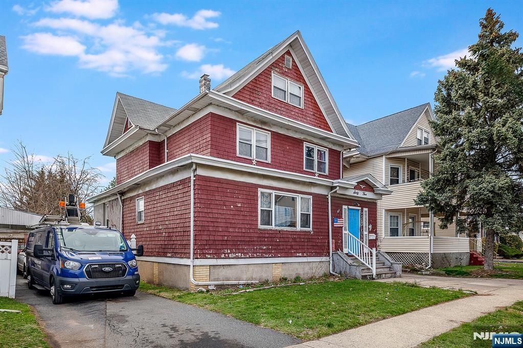 Photo of 65 Marsellus Place, Garfield, NJ 07026 (MLS # 26007174)