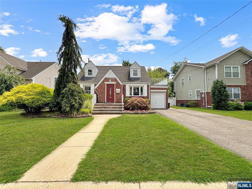 Step into this beautifully maintained home tucked away on a quiet cul-de-sac. Featuring a double driveway and attached garage, gleaming hardwood floors, an updated kitchen and bath, two bedrooms on the main level, and a spacious third bedroom upstairs with bonus space and rooftop terrace. The bright sunroom opens to a patio and large backyard - perfect for relaxing or entertaining. Laundry in basement. Tenant responsible for lawn care and snow removal. Utilities separate.
