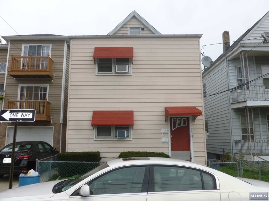 Legal Two Family Home. Both tenants pay their own utilities. There is a washer dryder hookup in basement. The 2nd floor and attic have two zone heating. Street Parking Only.