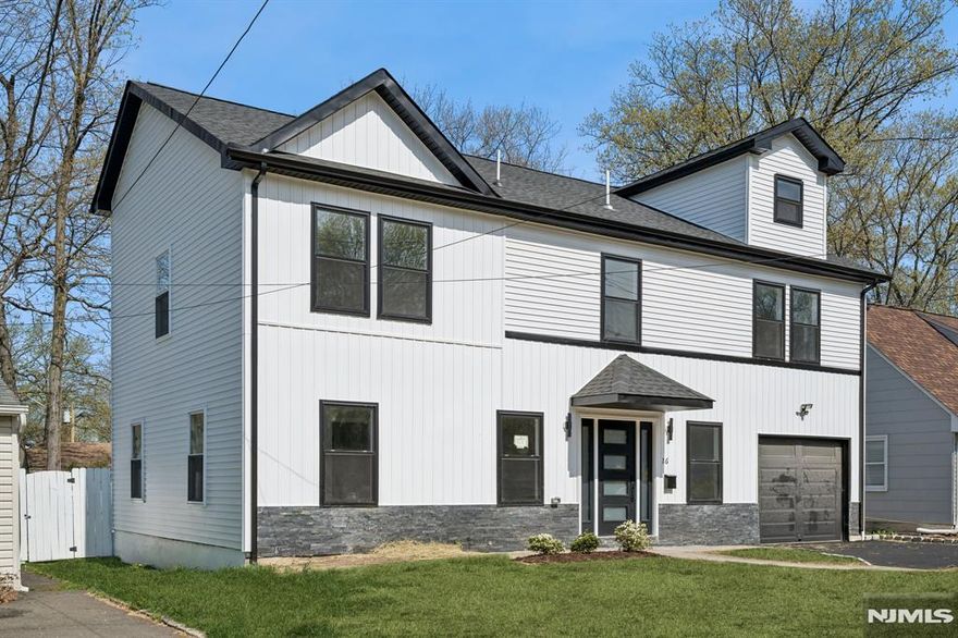 Nestled in the sought-after Mt. Pleasant section, this beautifully renovated 6-bedroom, 3 full bath Colonial seamlessly blends timeless charm with modern living. Thoughtfully updated throughout, the home offers incredible flexibility for today's lifestyle.The main level welcomes you with a warm, inviting open-concept layout, featuring a spacious living room, dining area, and a stunning kitchen equipped with brand-new stainless steel appliances, a center island, and a pantry perfect for everyday living and entertaining. Two well-sized bedrooms, a full bath, and a convenient laundry room complete this level. Upstairs, you'll find four generously sized bedrooms, including a primary suite with a walk-in closet and a beautifully designed en-suite bath featuring a rainfall shower head. An additional full hall bath services the remaining bedrooms. Step outside to your private backyard oasis, complete with a fully fenced yard and a new paver patio, ideal for relaxing or hosting gatherings. Also features an attached one-car garage along with additional off-street parking. This home is designed for both comfort and style, this home is an exceptional opportunity you won't want to miss.