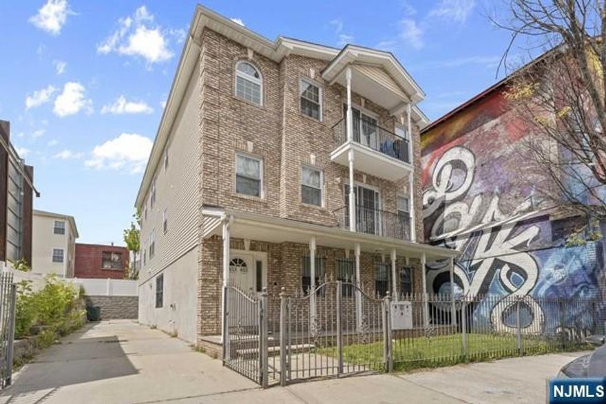 Incredible investment opportunity in the heart of Newark, where a major development boom is driving real estate prices upward. This spacious three-family property features large apartments, each boasting over 1,500 sq ft of living space. Additionally, the property includes a two-car garage and plenty of parking, adding to its appeal.Enjoy stable cash flow with long-term tenants and unlock even greater potential with short-term rentals like Airbnb, thanks to its prime location just 10 minutes from Newark Liberty International Airport. Benefit from Newark's rapid transformation with new businesses, cultural spots, and infrastructure projects revitalizing the area.