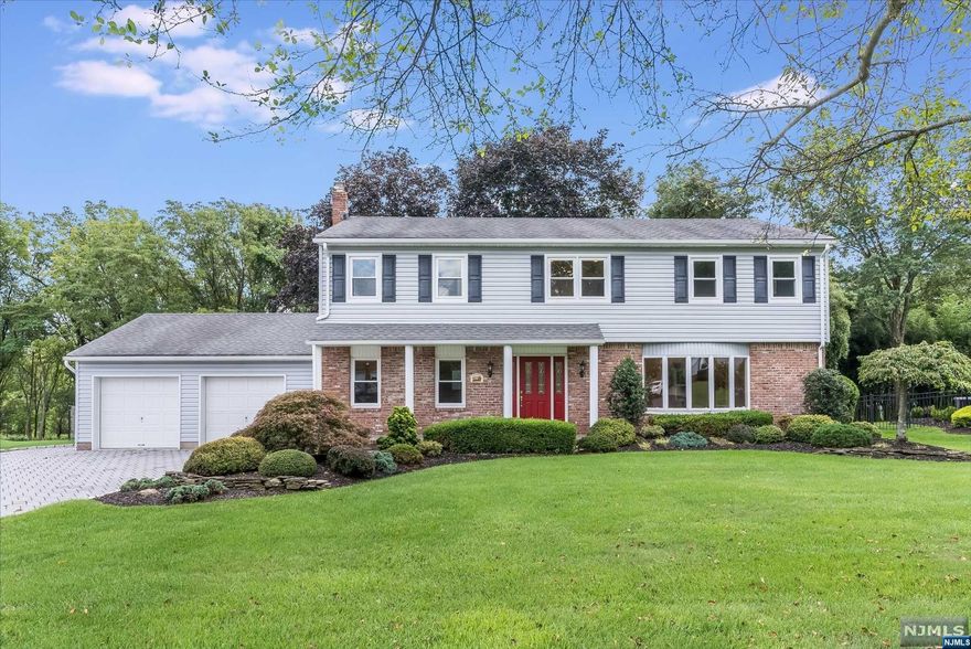 Stately Colonial with desirable cul-de-sac location featuring 4 beds & 2.5 baths! Comfortably greet your guests in entry foyer, which leads to the family room & formal living room. The family room is quite spacious & will be the perfect place to relax! Laundry room & powder room located off family room. Formal living room offers large bay window allowing natural light to fill the space & extenuate the HW floors. Large cased opening allows living room to flow effortlessly into dining room. The kitchen features plenty of cabinetry storage, SS appliances & sep. dining area. Retreat upstairs to find primary suite offering large bedroom w/ 2 walk-in closets, which are both outfitted & en suite w/ storage vanity & stall shower. The 3 addt'l bedrooms offer spacious closets. Full bath w/ storage vanity & stall shower w/ glass enclosure complete the 2nd floor. Basement is partially finished with den area, utility room & storage. The backyard offers patio area & level yard. 2-car garage.