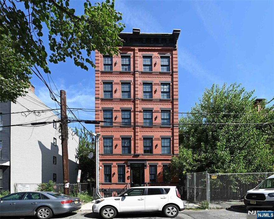 This is a rare and exceptional opportunity to acquire a fully gut-renovated, 10-unit multifamily building at 208 15th St, located in the dynamic and rapidly appreciating Downtown Jersey City market. This turnkey asset offers a perfect blend of luxury, location, and stability, making it an ideal investment for both seasoned investors and those looking to enter the high-growth Jersey City real estate market. The building has undergone a complete transformation, with every detail considered for modern luxury living. Upon entering, tenants and guests are greeted by a beautifully designed and inviting lobby, adorned with large mirrors that create a sense of elegance and space, setting the tone for the high-end residences within. Each of the ten units has been meticulously renovated to the highest standards, featuring modern amenities that are highly sought after by today's renters. Unit highlights include gourmet kitchens with brand new stainless steel appliances, premium countertops, and custom cabinetry. The bathrooms feature stylish fixtures and sleek finishes, and every unit has an in-unit washer and dryer. You will also find beautiful hardwood floors and thoughtful design details throughout each residence. A significant draw for tenants are the first-floor units that offer highly desirable private backyard access, providing a serene urban oasis. With a mix of unit layouts, the building is poised to attract a diverse and stable tenant base. The prime location provides exceptio