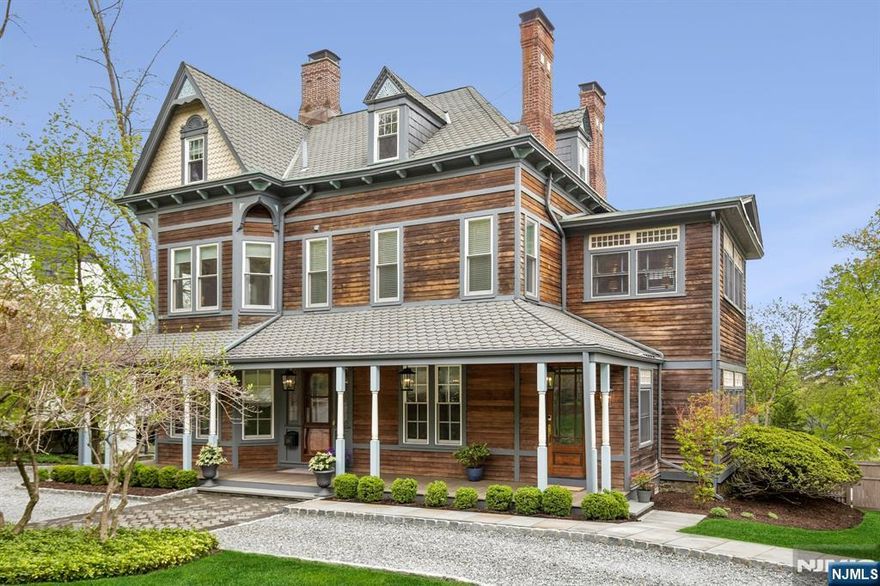 Stunning and iconic 1885 Victorian, meticulously renovated and thoughtfully reimagined for todayâ€™s modern lifestyle, blending timeless architectural character with exceptional contemporary updates. Ideally located just one block from Upper Montclair Village, enjoy premier dining, shopping, fitness studios, the historic Bellevue Theatre, the Olmsted Brothers-designed Anderson Park, and bus/direct train service to NYC. Set on nearly a half-acre of beautifully landscaped grounds, the outdoor living spaces are extraordinary, featuring the always coveted welcoming front porch, an expansive new bluestone patio with outdoor kitchen and gas firepit, large deck off the kitchen, privacy fencing, landscape lighting, and new circular front driveway & walkways. This impressive home offers a primary en-suite with separate dressing room, 5 total bedrooms, 3 full baths, 2 half baths, & 5 fireplaces. Recent interior renovations include a designer kitchen with center island, Sub-Zero and Wolf appliances, & walk-in pantry, three renovated baths, new Pella Architectural Series windows, new hardwood floors and carpeting, new interior doors, and new recessed lighting throughout (and so much more). A spectacular vaulted great room on the 3rd floor provides incredible bonus & flexible living space. Complete with a detached â€œgingerbreadâ€ two-car barn garage, this is a rare opportunity to own one of Montclairâ€™s truly special homes.