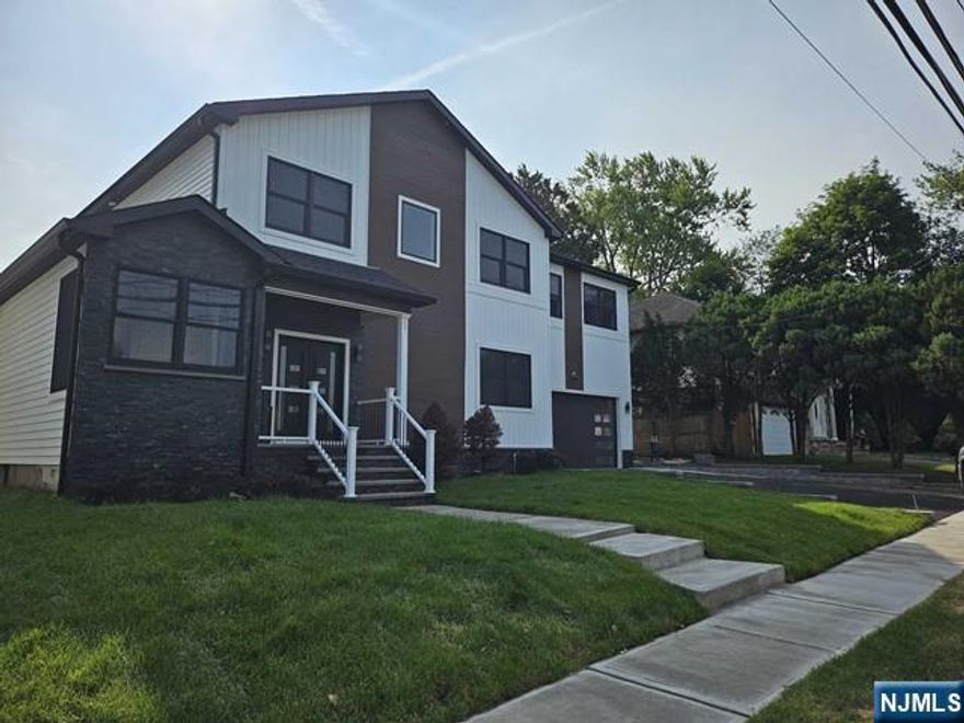 Discover this expansive 4200 sq ft of finished space colonial. Meticulously crafted 5 bedrooms, 6 bathrooms on new and existing foundations.1st Flr features an open, sunlit layout W/high ceilings, a gas fireplace, and detailed wood trim.A guest bedroom, full Bath, stunning hardwood floors, and Andersen windows.A Chef's kitchen boasts stainless steel appliances, quartz countertops, dining area, spacious family room, breakfast nook, and mudroom w/half bath. Step outside to a large deck overlooking the spacious yard.Enjoy multi-zone heating and A/C for comfort.2nd Flr has 4 bedrooms with a Master suite & full bath, double sink vanity, soaking tub, shower, and 2 walk-in closets.2 full baths and a laundry room.The finished basement adds more space with a gym, play area, half bath, storage.Access top schools, a pool, community center, and near Bus, NYC train, highways, shopping, dining, and worship places.Ideal for those seeking luxury, space and convenience. Schedule your viewing today