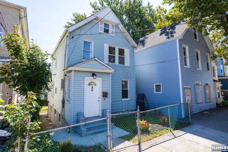 If you are looking for value in this crazy market, then look no further than this updated colonial home in the Vailsburg section of Newark! This home is located on a great block surrounded by new construction homes and offers 3 levels of living space, renovated kitchen, and 2 full renovated bathrooms. The first floor layout includes a spacious living room / dining room and open kitchen combination, full bath, and bedroom. On the 2nd level are 2 more bedrooms and another full bath. The bonus walk up attic space can be a 4th bedroom, office, or is perfect for extra storage. The basement is a nice size and has a lot of potential. Enjoy the back porch overlooking the big backyard that's perfect for entertaining. Upgrades include new kitchen and bathrooms, refinished floors, fresh paint, updated plumbing, forced hot air heat, freshly painted back deck, and landscaped front and back lawn.