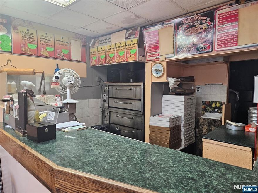 This Pizzeria has been serving the Clifton community for an impressive 30 years. With a Prime location in this highly populated area where foot traffic flows naturally past your door every day. Picture this: you're positioned perfectly near major highways and convenient bus stops, making it easy for customers to find you whether they're commuting, shopping, or just exploring the neighborhood. Here's what makes this opportunity even sweeter - you'll benefit from remarkably low rent, which means more money stays in your pocket each month. When you step into ownership, everything you need comes with you: all equipment is included along with current inventory, so you can start serving customers from day one.Thirty years of operation means this business has weathered every challenge and proven its staying power. You're not just buying a restaurant; you're inheriting a neighborhood institution with deep community roots and proven profitability. The location does the marketing for you with its natural visibility and accessibility. Whether customers are grabbing a quick slice during their commute or bringing the family for dinner, you'll have the foot traffic and convenience factor working in your favor. This is your chance to own a piece of Clifton's dining landscape with an established reputation, loyal customers, and all the tools for continued success already in place.