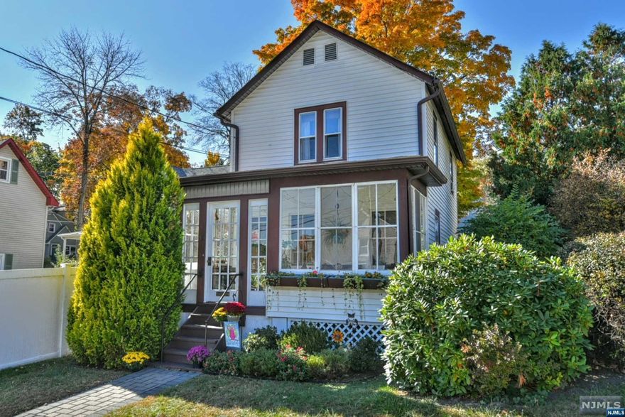 This is the one... Don't miss out seeing this charming cozy Colonial home. It won't last long. Walk up the paver walkway and enter the home through a very welcoming enclosed porch. The home features 2 bedrooms, 1 bath, living room with crown molding, and a nice size eat in kitchen with a mudroom off the kitchen. Wood floors throughout the home are original. Hardware on the knobs, locks, and hinges on all interior doors are original. Basement is full, unfinished and offers lots of storage and laundry. Step out back to a very deep private fenced in backyard, great for entertaining. Enjoy the gorgeous perennials that bloom all Spring and Summer. There is a detached garage with storage room off the garage and a very nice long paver driveway. Close to schools, shopping, major highways, transportation. Agent Rema