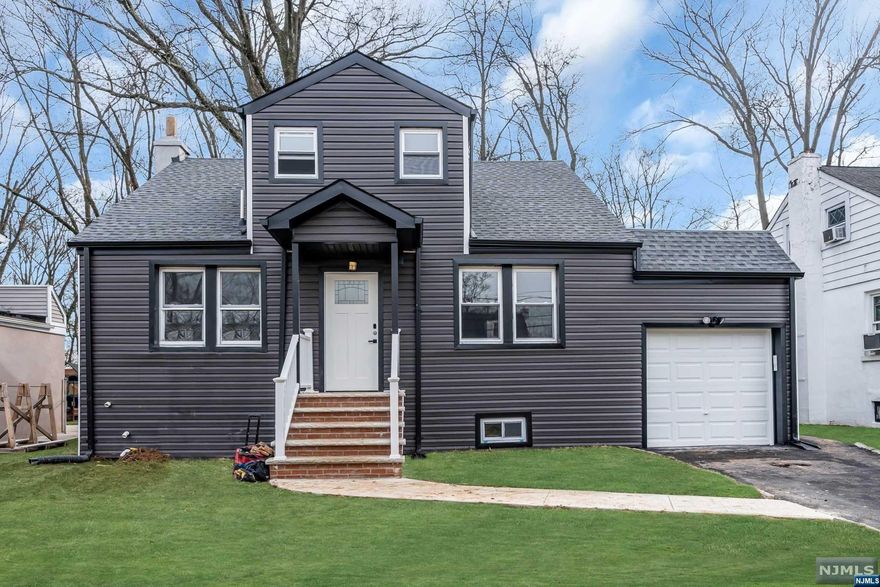 Welcome to 408 Jouet Street in Roselle, NJ! This newly renovated home seamlessly combines style and comfort. The ground floor features a spacious living and dining area, complemented by a modern kitchen with stainless steel appliances. With a master bedroom and full bath on the ground floor, 2 additional bedrooms upstairs with a full bath, and 2 more bedrooms in the basement with another full bath, there's plenty of room for everyone. One of the upstairs bedrooms opens to a charming porch for outdoor relaxation. New HVAC, roof, and siding ensure long-term comfort, while recent replacements of the hot water heater and furnace emphasize efficiency. Washer-dryer hookups add convenience, and garage parking is available. Spacious back yard to entertain! Located in the heart of Roselle, this home offers modern amenities and a well-thought-out layout. Schedule a viewing today and envision yourself calling 408 Jouet Street home!