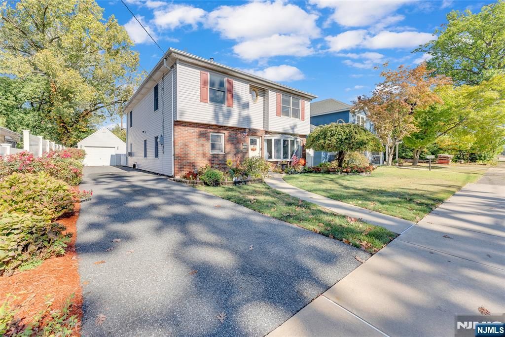 Photo of 62 Grove Avenue, Rochelle Park, NJ 07662 (MLS # 25036837)