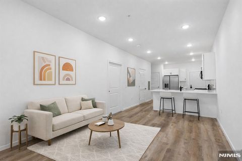 Photo of 51 E Main St #210, Bergenfield, NJ 07621 (MLS # 26003144)