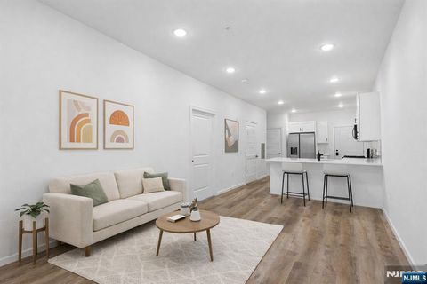 Photo of 51 E Main St #210, Bergenfield, NJ 07621 (MLS # 26003144)