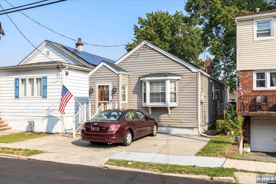 Welcome to this beautifully renovated home with Solar panels in a great commuter's town making it easy to get into NYC! Easy one floor living with hardwood floors throughout! The huge, renovated kitchen features modern appliances and ample counter space. 2 large bedrooms and a renovated bathroom complete the first floor. The full, partially finished basement offers additional room for creativity ideal for a rec room, gym, office or extra storage. Don't miss your chance to make this charming ranch home all yours schedule your showing today! Not in a flood zone. Solar panels on the roof - contract can be transferred to new buyer - monthly payment is $147/month, homeowner states he does not get any bills for electric!