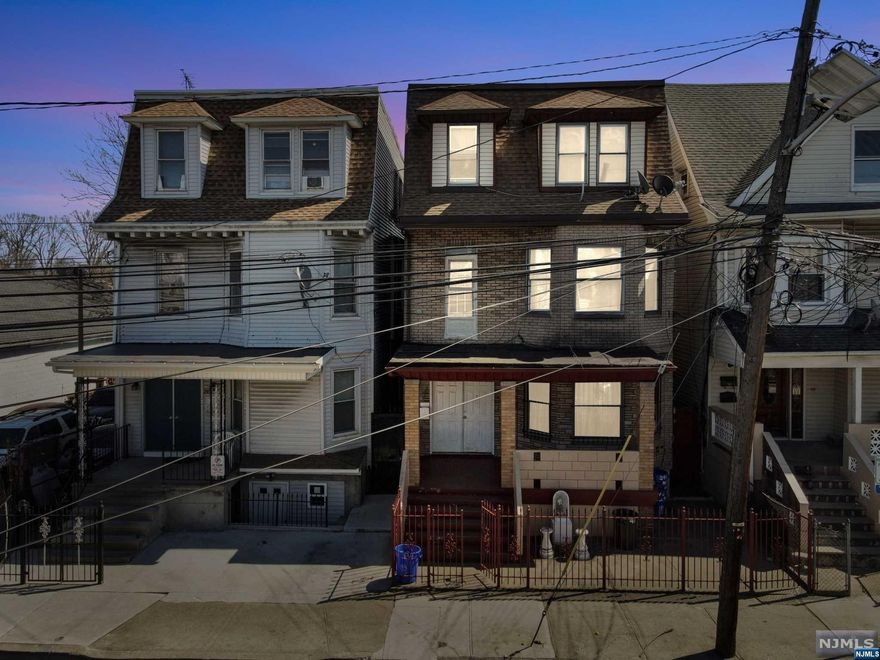 GREAT INVESTMENT PROPERTY FEAT. TOTAL OF 9 BEDROOMS, 4 FULL BATHS AND FINISHED BONUS BASEMENT, BACKYARD. THIS THREE FAMILY HOME, IN THE BORDER OF UPPER AND LOWER ROSEVILLE SECTION OF NEWARK. THIS PROPERTY SITS TWO BLOCKS CONVENIENTLY FROM BRANCH BROOK PARK ALL IN WALKING DISTANCE. ALSO WITHIN SHORT WALKING DISTANCE TO THE LIGHTRAIL PARK AVE STATION. BUS STOPS OFF PARK AVE AROUND THE CORNER.