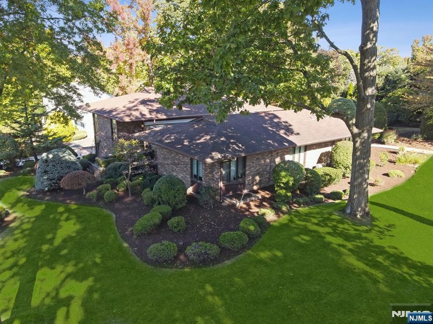 This beautiful custom-built ranch offers an unparalleled combination of luxury, space & convenience close to shopping, dining & moments away from the heart of NYC.The open-concept design creates a seamless flow throughout the main living areas, ideal for entertaining & daily living. From the EF enter a large vestibule that flows into a banquet sized DR, adjacent to a large LR, both w/ balconies and cath. ceilings. Relax in the wood paneled Fam Rm w/ build ins. Entertain in the Great Rm w/ FP leading to professionally landscaped grounds. The expansive center island kitchen w/ cath. ceiling is adjacent making it a great place to entertain. The primary BR offers a full dual sided bath & 3 BRâ€™s & 2 FB completing the sleeping space on the 1st fl. The lower walk out level is complete w/ a very large Rec. Rm, BR/Office, FB & cedar closet along w/ a 3-car tandem garage.This home is truly one of a kind, featuring custom architectural details that give it a distinctive character.