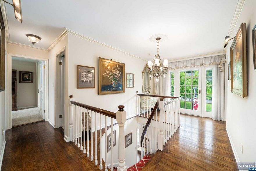 One-of-a-kind 4600 SF home in fabulous North Caldwell, a 6 bed/7 bath colonial that includes a full 3 floor suite for multigenerational living. This home has many unique features for modern living. From the formal dining & living rooms to the custom semi-spiral staircase that leads you to owner's suite & 3 bedrooms, you've only just begun the exploration. Take the side drive & you'll enter through a separate entrance or from one of 3 garages for quick access to the kitchen & ensuite w/ 2nd owner's bed & bath located on the 1st fl. Or head straight to the solarium overlooking the inground pool & spacious enclosed yard. The first of 2 large, finished basements, equipped w/ wine cellar, home office The second finished basement is used as a game room with at-home gym. Welcome to the Green Jewel of Essex County situated 19 miles from NYC. You will find the best town in Essex County with highly rated schools just minutes from direct buses and trains to NYC