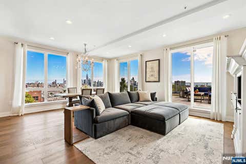 Photo of 502 Palisade AVE #PH 601, Jersey City, NJ 07307 (MLS # 26029276)