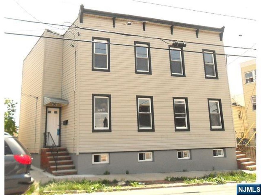 Beautiful renovation. Rare side by side (Duplex) layout. Each side contains 3 finished floors, 2 bedrooms and 3 bathrooms. Must see.!!!