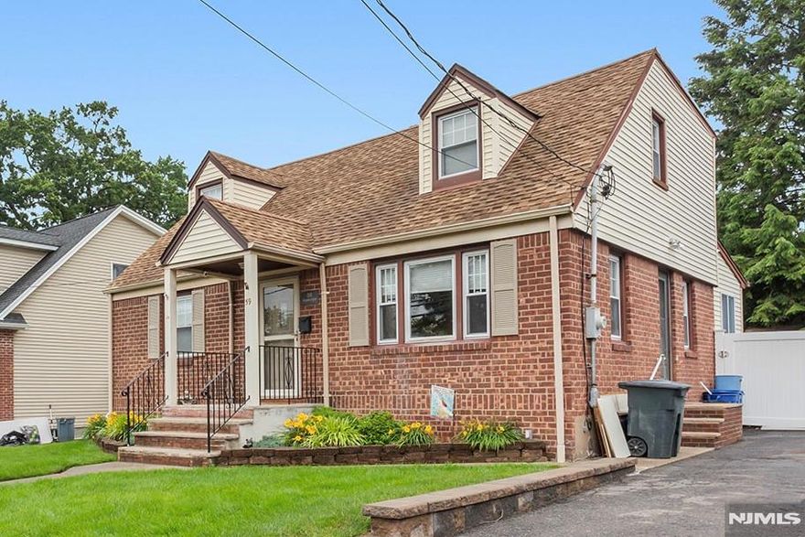 Welcome to 59 Parkview Avenue - a beautifully expanded Cape Cod where charm meets modern comfort. This 3-bedroom, 2-bath home offers exceptional living space across a thoughtfully designed layout. The heart of the home is a large, open-concept kitchen and dining area featuring ample cabinetry, a breakfast bar, and natural light pouring through generous windows. A second-floor primary suite designed for privacy and relaxation, is complete with a walk-in closet and its own ensuite bath. A rear addition and dormer expand the home's footprint, offering even more usable space. Head downstairs to a fully finished basement - perfect for a media room, playroom, or home gym. Outside, sliding glass doors open to a spacious deck and a fully fenced backyard with a shed equipped with electric, ready for hobbies or extra storage. Additional highlights include a 3-car driveway, upgraded 200 amp electrical panel, hardwood floors, central air, and efficient 4-zone hot water heat. Schedule your showing today!