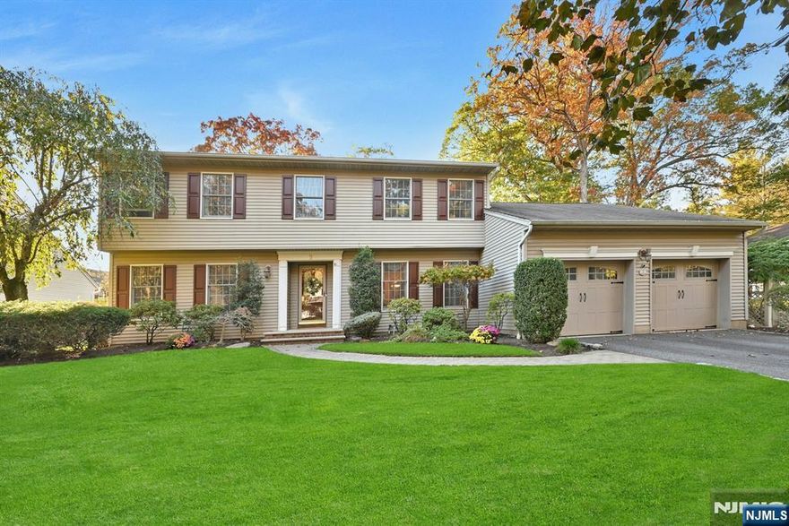 A HOME OF SPACE AND COMFORT! Welcome to 9 Appeld Ct, an elegant and spacious home, tucked away on a quiet cul-de-sac featuring a backyard oasis boasting an In-ground, heated, saltwater pool w/newer liner & waterfall. Built in 1989, this 5 BR, 3.5 Bath CH Colonial offers over 3,700 sq ft, not including the finished basement. Step inside the inviting foyer & discover the beautifully maintained living space designed for flexibility & entertaining. There is a gorgeous Living rm, a banquet sized Dining rm & an updated kitchen w/granite counters, SS appls, tile backspalsh & flooring featuring a center island w/seating, & separate dining overlooking the private yard w/lush landscaping & expansive paver patio. Just off the kitchen are 2 Lg pantry closets, a powder rm & huge lndry rm w/shelving. The home office w/closet & built-in desks could be utilized as a 1st flr BR. The Great rm w/FPL & vaulted ceiling accesses the deck & 2 car att/garage. Upstairs, the Primary suite offers a peaceful retreat w/2 custom walk-in cls & spa bath w/radiant heat, steam shower w/seating, jetted tub & 2 vanities. Three add'l BRs w/great closet space & hall bath w/tub & dbl sinks complete this level. The finished basement adds extra living space, approx 1,200 sq ft, for movie/game nights, gym, 5th BR w/egress wndw, gym & ample strg.. New 2 Zone CAC installed approx 2 yrs. Located near NYC Transp, Schools, Parks & Downtown Hillsdale, this home truly combines suburban tranquility with everyday convenience.