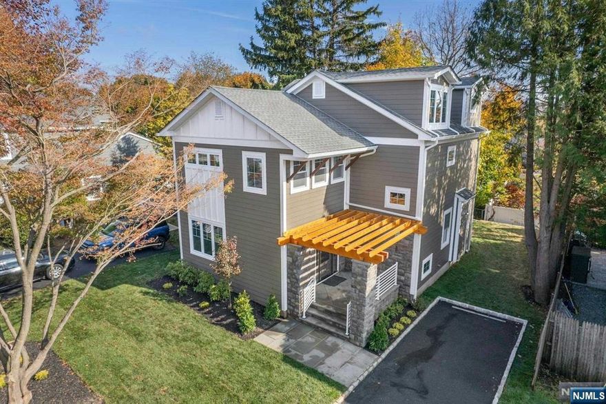 Stunning, New Construction Luxury Home! Nestled on a serene cul-de-sac, this exquisite luxury residence offers the perfect blend of quality, comfort, and convenience. Spacious 4 Bed/4.5 Bath home designed for both relaxation and entertaining. Step inside to discover an impressive double wide staircase that sets the tone for elegance throughout. Custom kitchen is a chef's paradise, featuring quartz countertops and a striking bookmatched backsplash overlooks the great room with stunning fireplace. High-quality materials used throughout, you'll appreciate the craftsmanship and attention to detail that define this home. Enjoy the ultimate in-town lifestyle, with an array of restaurants, shopping, and parks just a stone's throw away. Experience the convenience of quick access to New York City, major highways, and multiple modes of transportation. This remarkable home also comes with a 10-year new home builder's warranty, providing peace of mind for years to come.