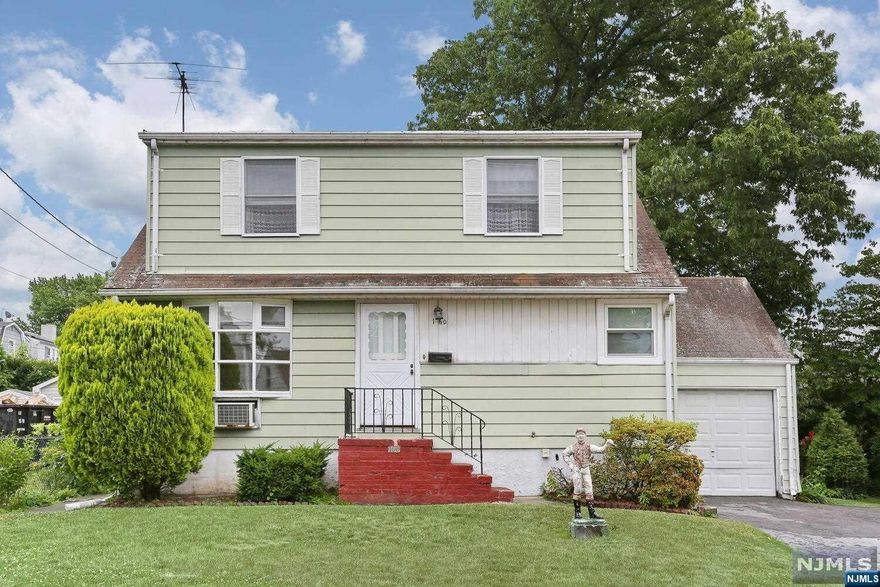 Cape Cod located on a nice 75' wide lot. Second floor has a full bathroom. Hardwood floors throughout the ground floor. Full basement has a large rec/family room and half bath that needs a bit of work. Attached garage, tandem parking and a shed in backyard. With some updating this could be the perfect buy...walking distance to Jefferson Elementary School and NYC transportation. Come take a look!