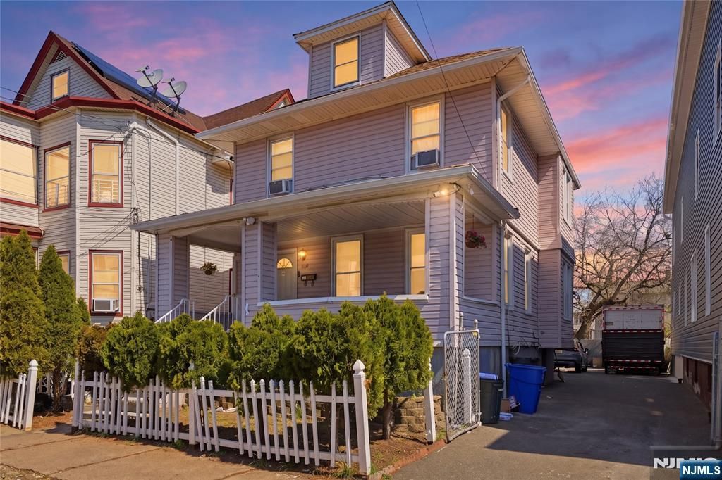 Photo of 140144 Lily Street, Paterson, NJ 07522 (MLS # 26014349)