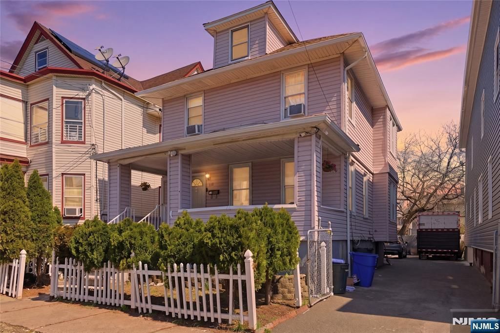 Photo of 140144 Lily Street, Paterson, NJ 07522 (MLS # 26014349)