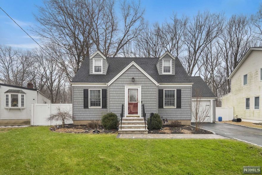 Welcome to 252 Washington Avenue! Where curb appeal meets an updated, move-in ready interior. This expanded Cape with attached garage on quiet, tree-lined street features 3 Bedrooms (possible 4th) & 2.5 Baths on a large, level lot with an expansive deck and backyard perfect for outdoor entertaining. First floor features an Entry Foyer, Living Room, Dining Room, Kitchen w/ center island, granite counters & stainless appliances, Breakfast Room w/slider to deck, Full Bath, Bedroom and a Family Room with wood burning fireplace. Second floor features Master Bedroom w/WIC, Full Bath and large 3rd Bedroom. Full, partially-finished Basement includes Rec/Bonus Room, Laundry, 1/2 Bath, Utilities w/walk-out. Impeccably landscaped with fully-fenced in backyard, abutting county parkland. Newer siding, roof, windows, doors, shed, HVAC('16) & Central AC('18). Brand new HWH, driveway & paver walkway. Truly a must see! Nothing to do but unpack! HIGHEST & BEST DUE APRIL 7TH AT 12PM.