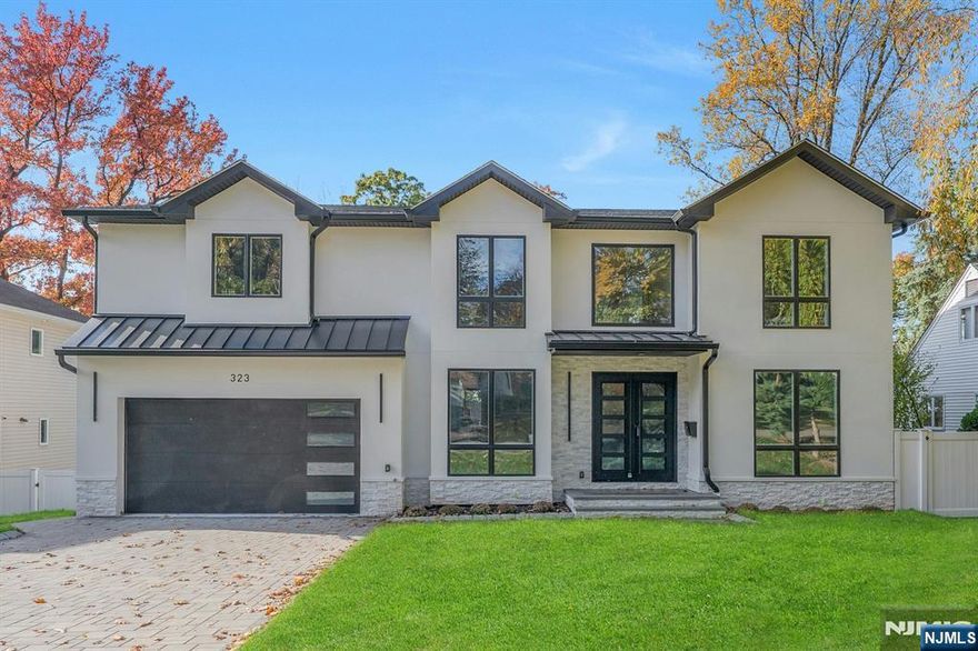 New Construction- Quality-crafted, luxury brand-new home, built to the highest standards by well-reputed & established builder, located on a prime street, in the sought-after Paramus East Side neighborhood. Dramatic, 2-story entry foyer. Gorgeous, well-equipped chef's MEIK, w/huge island, custom cabinetry & designer finishes. Magnificent 2-story great room w/gas fireplace. Desirable 1st FL ensuite BR/FB. Lavish, PBR Suite w/serene spa bath, and 2 ample WI closets. Full, nicely finished WO LL w/expansive FR/Rec Rm, Media Rm/Home Theater, BR, FB, and more. Exceptional floorplan w/bright, generous, functional space. Sleek, on-trend design, exquisite architectural details, upscale materials & premium appointments, including double sliding exterior doors to the engineered deck & paver patio, convenient 2nd FL laundry, and more. It's modern living at its finest! Fenced backyard w/pool & patio. 2-car garage. Close to all! Home is being built. PLEASE DO NOT WALK THE PROPERTY/ENTER THE ACTIVE CONSTRUCTION SITE. Kindly contact the listing agent for information.