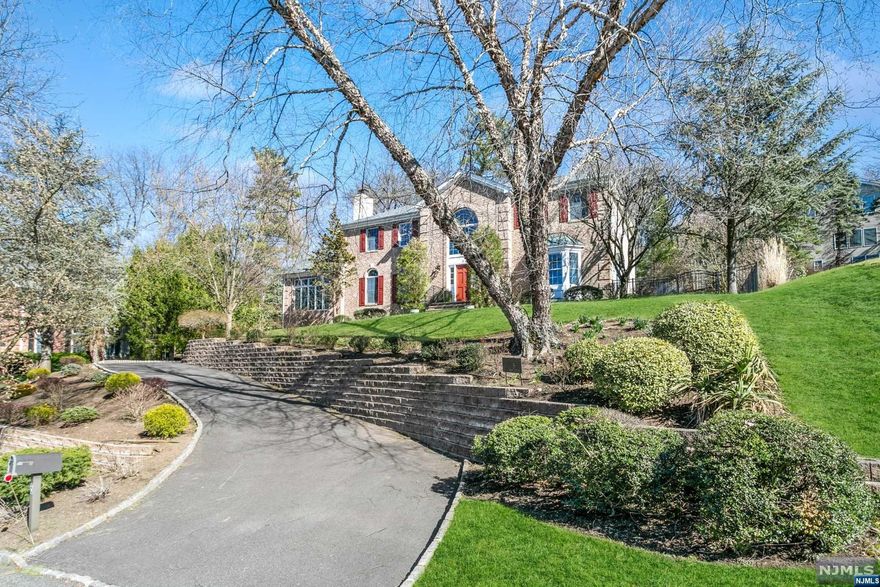 Prestigious home nestled atop professionally landscaped grounds in a desirable cul-de-sac location!Sophisticated open floor plan boasts spacious,sun-filled rms w/designer finishing touches,sprawling hardwood floors,oversized windows.2-story foyer w/sweeping curved stairs.Living rm w/modern fireplace & tall arched windows.Conservatory w/walls of floor-to-ceiling windows.Office w/double French doors.Dining rm w/tray ceiling,dazzling chandelier,bay window.Open-concept fam rm & kitchen w/abundant natural light,& serene views.Fam rm w/handsome fireplace & wall of floor-to-ceiling windows.Gourmet kitchen with accented cabinetry,high-end appls,granite counters,& large size center island. Designer powder room.Spacious Master bedroom w/sitting room & well-appointed ensuite bath.2 bedrooms share Jack-&-Jill bath;4th bedroom w/ensuite bath.Beautiful finished basement w/5th bedroom & full bath.Close proximity to NY trains,award winning Chatham schoolsshopping,restaurants and major highways!