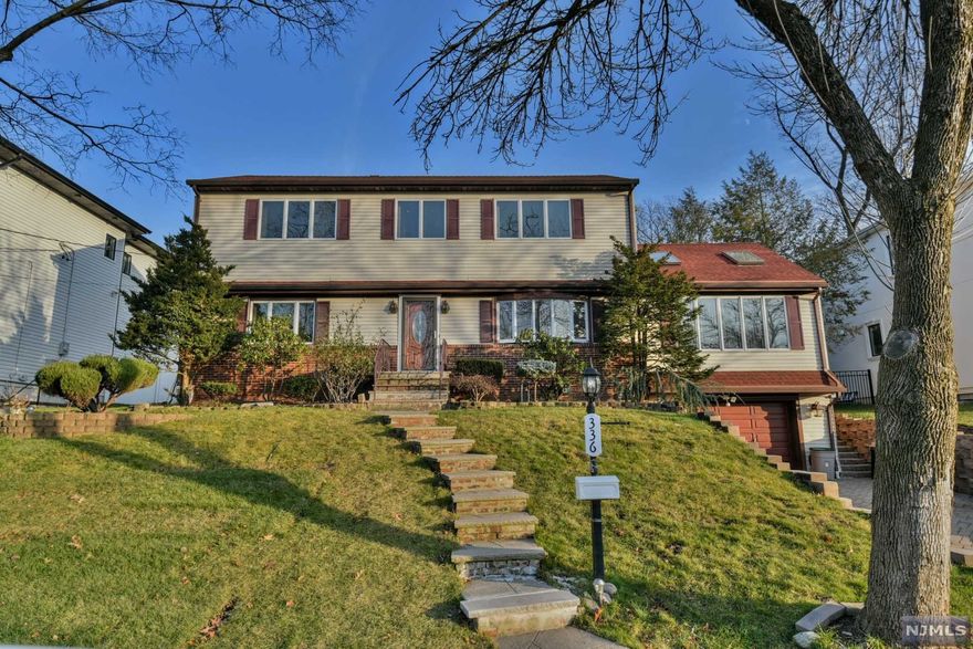 COME SEE THIS SPACIOUS EXPANDED CAPE WITH VERY NICE SIZED ROOMS (2272 SQ. FT. TOTAL). FIRST FLOOR FEATURES TWO BEDROOMS, FULL BATH, KITCHEN W/DINING AREA, LIVING ROOM, GREAT ROOM/DINING ROOM W/TWO SKYLIGHTS. BEAUTIFUL HARDWOOD FLOORS. SECOND FLOOR PROVIDES TWO MORE BEDROOMS. THE MASTER BEDROOM INCLUDES A LOVELY NEWER BATH WITH SHOWER & TUB. A SECOND FULL BATH & BEDROOM.TWO CAR TANDUM GARAGE (APPROX. 30' LONG). LOVELY, PRIVATE BACKYARD WITH A COVERED PATIO. ONE YEAR OLD ROOF. HOME SITS ON 75' X 125' PROPERTY ON A CUL DE SAC. ALTHOUGH THIS IS A QUIET, OUT OF THE WAY AREA, IT IS ALSO A SHORT DRIVE TO THE MALLS & MAJOR HIGHWAYS. MANY NEWER HOMES WITH $1,000,000 PLUS VALUE MAKE THIS LOCATION A MUST HAVE. LOW PARAMUS TAXES ($9230)!