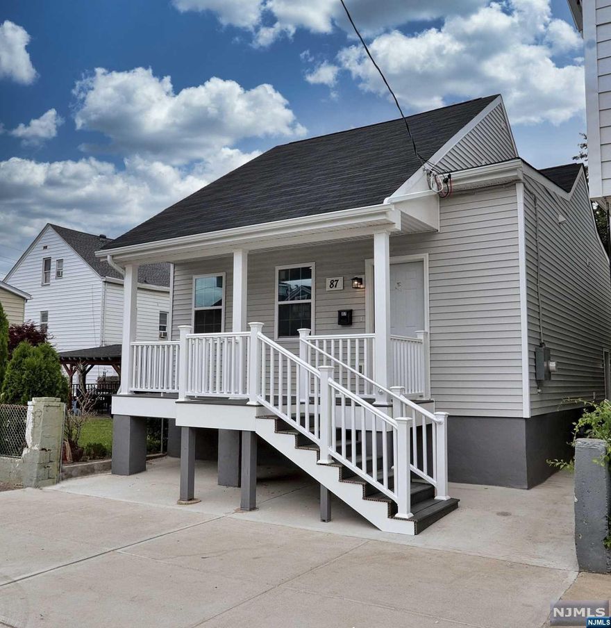 Welcome to this exquisite completely renovated Ranch with a spectacular front porch and this property is close to Anthony Lucas Park and all that this neighborhood has to offer. Enjoy being close to Schools and NYC Transportation.Through meticulous care and thoughtful updates, this home remains elegant and modern while retaining its historic charm. Inside, you will love its airy open concept space, woodwork finishes, fireplace, and gleaming laminate floors throughout. You will also be thrilled with the well-equipped, designer kitchen, complete with stainless steel appliances. Two additional bedrooms and full hall bath complete the first level. The second floor is host to the tranquil master bedroom suite featuring a closet and master bath with a shower stall. The finished basement features even more living and recreational space with its own thermostat and private side entrance with the future option of adding a shower stall for guests or extended members.