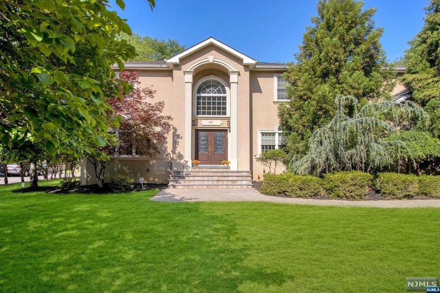 Exquisite Center Hall Colonial with beautiful architectural details throughout, on a large property in River Vale! Grand 2-story entrance with dramatic winding staircase. Spacious formal living room and bright and open banquet-sized dining room. Expansive great room with soaring ceilings, fireplace and floor-to-ceiling windows for an abundance of natural light. Immaculate gourmet kitchen featuring large center island, wood cabinets, granite countertops and stainless appliances. Two large bonus rooms/offices, half bath and laundry room completes this level. Second level offers a Juliet balcony overlooking the great room. Luxurious and expansive primary suite including sitting area, walk-in closets and primary bath including jetted tub and separate shower. Large Junior suite with modern full bath. Two additional bedrooms with Jack and Jill bath. Generous-sized lower level with high ceilings to finish and make your own! Professionally landscaped lush property including paver patio.