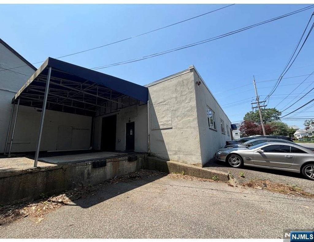 Photo of 41 Woodbine Street, Bergenfield, NJ 07621 (MLS # 26000805)