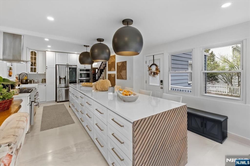 Photo of 338 S Van Dien Avenue, Ridgewood Village, NJ 07450 (MLS # 25037873)
