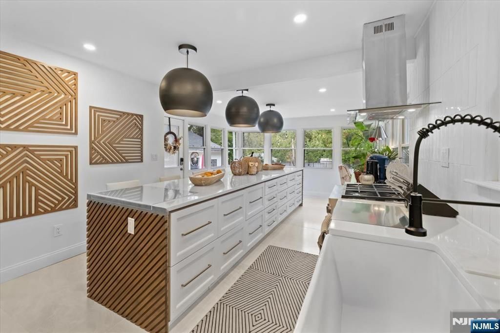 Photo of 338 S Van Dien Avenue, Ridgewood Village, NJ 07450 (MLS # 25037873)