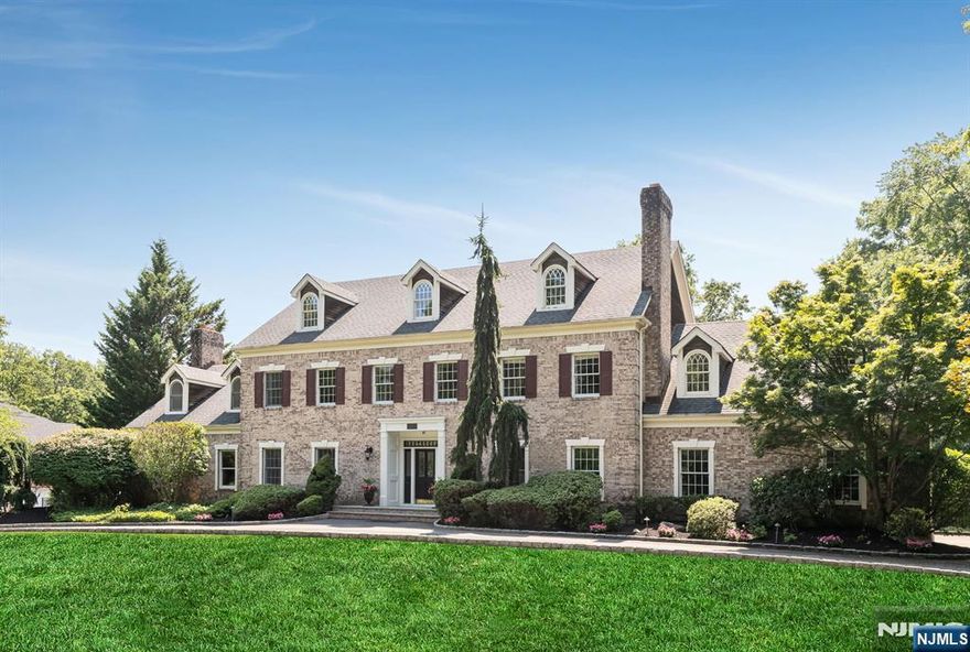 Nestled on a quiet cul-de-sac in a prime neighborhood, this stately colonial offers the perfect blend of classic elegance & resort-style living. The 2-story foyer welcomes w/ impressive scale. The main lvl features a sun-drenched great room w/ vaulted clg, stone FP, custom built ins, & sliders to the rear oasis. The expansive chefâ€™s kitchen boasts a seated island, granite countertops, a 36in Wolf range, & a sunlit breakfast area w/ sliders to the outdoors. Entertain w/ a banquet-sized dining rm & a welcoming living rm w/ FP. A private office, powder rm, laundry rm, & 3-car heated garage complete the 1st lvl. Upstairs, retreat to the lux primary ste w/ soaring ceilings & a spa-inspired bathrm (2022) featuring radiant floors, soaking tub, & oversized shower. An additional ensuite BR, 3 more generously sized BRs, & 2 beautiful full baths, including a new radiant-heated hall bath (2022), provide ample space for all. The fully finished lower lvl offers a spacious rec rm & bonus rm, ideal for a gym, playroom, or guest space. Designed for year-round enjoyment, the professionally landscaped backyard is a stunner! Perfectly situated is a saltwater pool & spa (2013), putting green, & expansive lawn. Unwind in the outdoor covered living rm w/ FP, theater projector & screen, custom built-in bar w/ granite countertops, refrigeration & sink. This extraordinary home offers luxury, privacy, location, & a dream yard. The perfect home to entertain on a grand scale or for intimate gatherings.