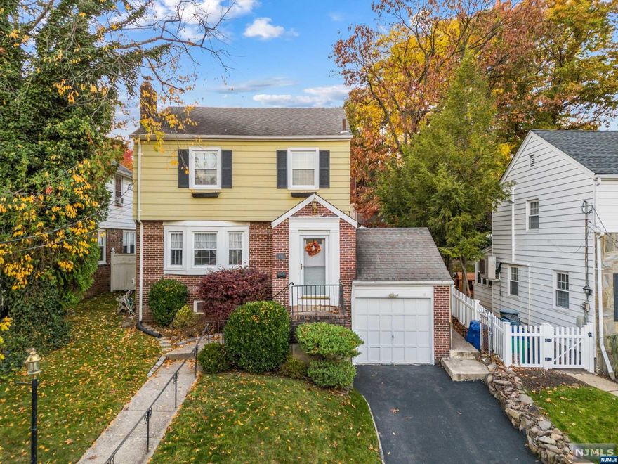 This Yantacaw classic side hall colonial is ready for your personal touch. It features 3 bedrooms and 2 full baths. On the first floor is a spacious living room, dining room and 3 season den. The second floor has 3 bedrooms and a full bath. The basement has a full bath and laundry area. The cozy yard and deck are great for entertaining and unwinding. It's fabulous location is ideal for commuting, enjoying Nutley's beautiful parks, shopping and entertainment.