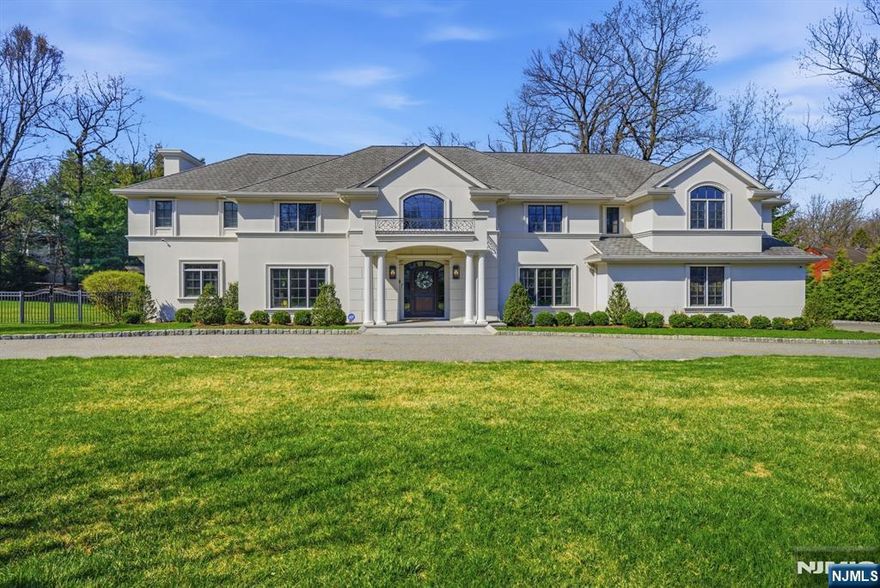 Set on one of Cresskillâ€™s most beautiful streets, this fully renovated stucco home offers exceptional curb appeal with a circular driveway. A grand double-height foyer opens to elegant living and dining rooms, leading to a brand-new chefâ€™s kitchen overlooking a magnificent family room with fireplace. An additional spacious TV room with its own fireplace provides flexible use as a bedroom or office. The main level also features two full baths, including a cabana bath for pool access, and a three-car garage. Upstairs offers five en-suite bedrooms, including a luxurious primary suite with a large walk-in closet and spa-like bath, plus convenient second-floor laundry. The fully finished walk-out lower level spans the footprint of the home and includes a bedroom, full bath, gym, sauna, and expansive recreation space. A seamless indoor-outdoor lifestyle completes this exceptional offering.