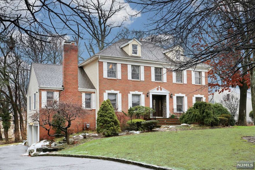 COME AND VIEW THIS SPACIOUS 4 BEDROOM, 2.5 BATH CUSTOM CENTER HLL COLONIAL. SITUATED ON A .35 ACRE OF PRIVATE PROPERTY, ON A CUL DE SAC STREET. ENTER THE FIRST FLOOR INTO CENTER HALL FOYER, LIVING RM, FORMAL DINING RM, POWDER RM, OFFICE/CUSTOM BUILT INS, LG.GOURMET EAT IN KITCHEN WITH SLIDING GLASS DOORS TO A PRIVATE REAR DECK, VAULTED CEILING FAMILY RM WITH WOOD BURNING FIREPLACE. THE 2ND.FLOOR OFFERS A LARGE MASTER BR SUITE WITH FULL BATH/TUB&SS, 3 MORE LARGE BEDROOMS AND A HALLWY FULL BATH/SOT. THE BASEMENT HAS A FINISHED RECREATION RM/BUILT INS, ENTRY FROM THE 2 CAR ATTACHED GARAGE, ANOTHER OFFICE/PLAY RM, LAUNDRY RM, UTILITIES & STORAGE. HARDWOOD FLOORING AS INSTALLED, SECURITY ALARM SYSTEM, CENTRAL VAC, UNDER GROUND SPRINKLERS. PLENTY OF CLOSET SPACE AND STRAGE SPACE. CLOSE TO SCHOOLS, SHOPPING AND PUBLIC TRANSPORTATION. THIS HOME IS IN MOVE IN CONDITION AND WILL BE A PLEASURE TO SHOW!!