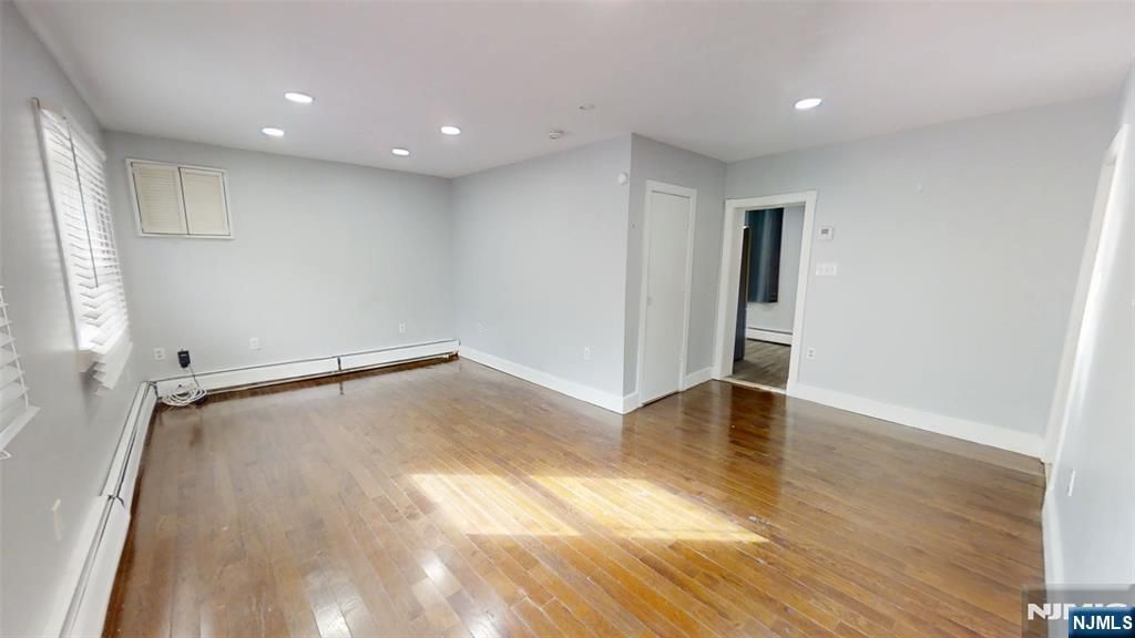 Photo of 115 Grant Avenue, Harrison, NJ 07029 (MLS # 25039786)