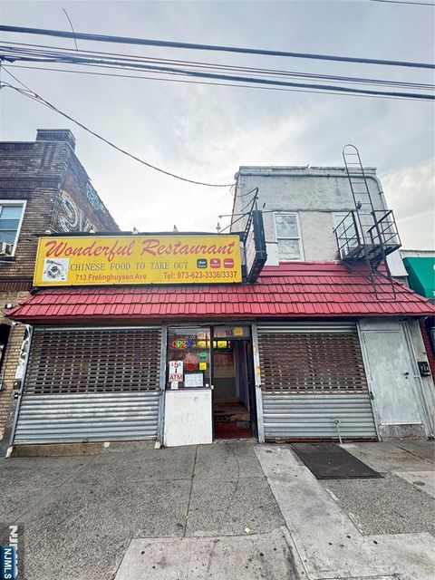 Photo of 713 Frelinghuysen Avenue, Newark, NJ 07114 (MLS # 25021677)