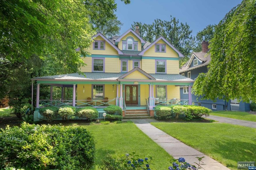 Victorian Splendor on Midland Avenue. This striking 6 bedroom home on Montclair's famous 4th of July parade route, boasts a wonderful wrap around front porch, large light filled rooms, an extra deep lot and a fabulous resort style in-ground pool area. It even has its own sandy beach and spectacular waterfall. Pool has colorful underwater lights for night swimming. A 2 story Great room and a screened in porch overlook the manicured lawn. This home features a large eat-in kitchen adjacent to the Great room as well as 6 bedrooms and 3.1 baths. All within 3 minutes of the Watchung train station and town center. There is 4 zone central air conditioning, a new roof, and a 2 car garage. Montclair living at its best!