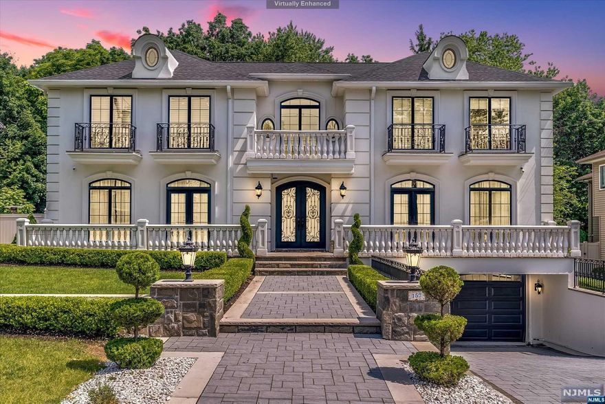 Stunning,luxurious one of a kind custom-designed colonial home built in 0217 features 5 bedrooms,5 full baths and a finished walkout ground floor. Upon entering you will find a unique curved-style living room with ceiling to floor windows that make the entire home bright and sunny.The gourmet eat-in kitchen offers custom cabinetry, center island and premium luxury appliances. Also on the first floor a spacious gorgeous dining room, a home office or a guest room, a full bath and a family room with a fireplace. Second floor features professionally designed Primary bedroom with accent wall, primary full bath with glass shower and a stand-alone tub and a walk-in closet. Also on the second floor:junior suite, two other bedrooms a full bath and a laundry room. The walk out ground floor has an additional room that can be used as a gym, a full bath and two car garage. Located on a beautifully manicured property, in prime Paramus location near schools,parks and NYC transportation.