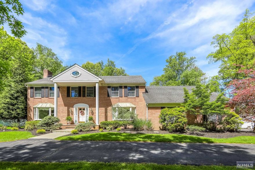 Welcome to this spacious Colonial. Upon driving up to the cul-de-sac, the grand circular driveway brings you to the lovely entrance & welcomes you into this warm & inviting home. The first floor boasts a large front to back living room with a wood burning fplc, 5th bdr/office with full bth & laundry room. One of the best features on the 1st floor is the beautiful sunroom, full of natural lighting and perfect for enjoying slow mornings with coffee or reading. The updated kitchen features sparkling stainless steel appliances, quartz countertops, tile backsplash, & spacious pantry. French doors off the eating area in the kitchen lead out to a large patio surrounded by lush garden & a newly refurbished pool ready for you to enjoy. The second level offers a primary bdr with WIC and master bath, as well as 3 additional bdr all with oversized closets & full baths. Lastly, the LL offers a fully finished basement. New carpeting and updates throughout, just move in.