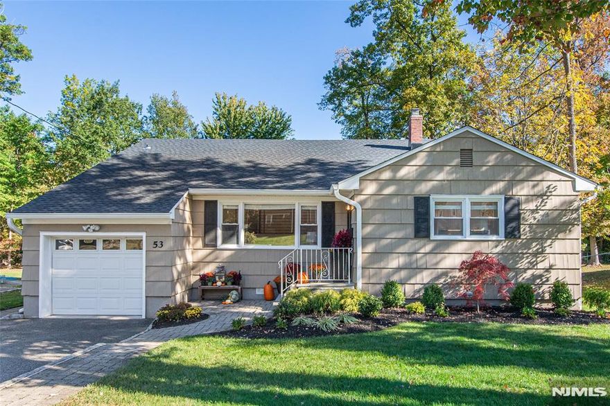 GORGEOUS NEWLY RENOVATED HOME IN DESIRABLE WEST CALDWELL !Move right in to this stunning 3-4 bedroom, 2.5 bath home featuring an open-concept layout and beautiful modern updates throughout. The sun-filled living room with vaulted ceilings flows seamlessly into the dining area, creating the perfect space for entertaining. The bright, cheerful kitchen features freshly painted cabinetry, new counters and backsplash, a new dishwasher, and a double-door refrigerator. Upstairs, the spacious primary suite includes a newly renovated bath with a glass shower door. Two additional bedrooms and an updated hall bath complete the second floor. The large lower-level family room overlooks a private patio and expansive, flat backyard with new sod and privacy trees perfect for outdoor gatherings. A bonus room offers flexibility as a gym, home office, or fourth bedroom, while the laundry room includes a brand-new washer and dryer.Additional updates include: new garage flooring, new railings and interior stairs, new insulation in the attic and crawl spaces, new front, storm, and rear screen doors, new condenser for central air, refreshed front landscaping, and fresh paint in nearly every room.There's truly nothing left to do but move in and enjoy! Nestled on a lovely street with exceptional privacy and close to major transportation. Easy to show - come see all the thoughtful upgrades for yourself!