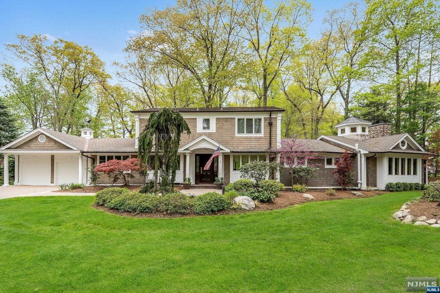 Escape to Luxury in Premier LOCATION! Custom architectural masterpiece set majestically on a private acre in coveted Donnybrook section. Impeccable and exceptional in architectural detail & design. The finest of custom millwork, quality craftsmanship & designer finishes! A one-of-a kind sure to impress! Open entertaining floorPln for grand entertaining, everyday living & flawless indoor-outdoor enjoyment. Gracious living & dining rm, Modern EIK w/center isl, granite & SS, sunny breakfast area & Home Office. Exquisite great room detailing vaulted ceilings, FAB arch detail & design, impressive cupola, deco & columned moulding & trim, custom wet-bar, WB frplc & more! Upper lvl feats Primary Ste w/Fbath, 3 addt'l BR's & ultra-lux full bath. IMPRESSIVE Lower lvl family room w/gas frplc, stone surround, custom cabinetry, dry bar, surround sound & gym. Private incredible RESORT-like rear yard w/patios, fire-pit, waterfall & pond, hot tub, basketball court! Suburban Living at it's FINEST!