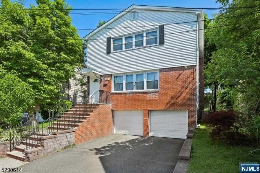 Located in one of New Jersey's most desirable towns, this multifamily home sits at the end of a quiet cul-de-sac. Renovated in 2014 and well-maintained since, it's currently fully occupied by tenants with excellent rental records. Each unit offers modern amenities including updated plumbing & electric, stainless-steel appliances, granite countertops, and hardwood floors throughout. Central air and forced air heat ensure comfort year-round, with laundry facilities in the basement for added convenience. Situated near shopping, dining, Liberty Airport, houses of worship, and the NYC Midtown Direct express, this property also includes a large basement & two-car garage for parking and storage. The newly sodded backyard provides space for entertaining and activities. Whether you're considering an investment or searching for your suburban residence, this property is ready to welcome you.